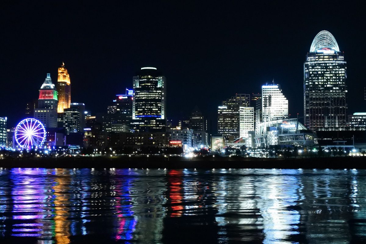 Downtown Cincinnati skyline at night along the Ohio River